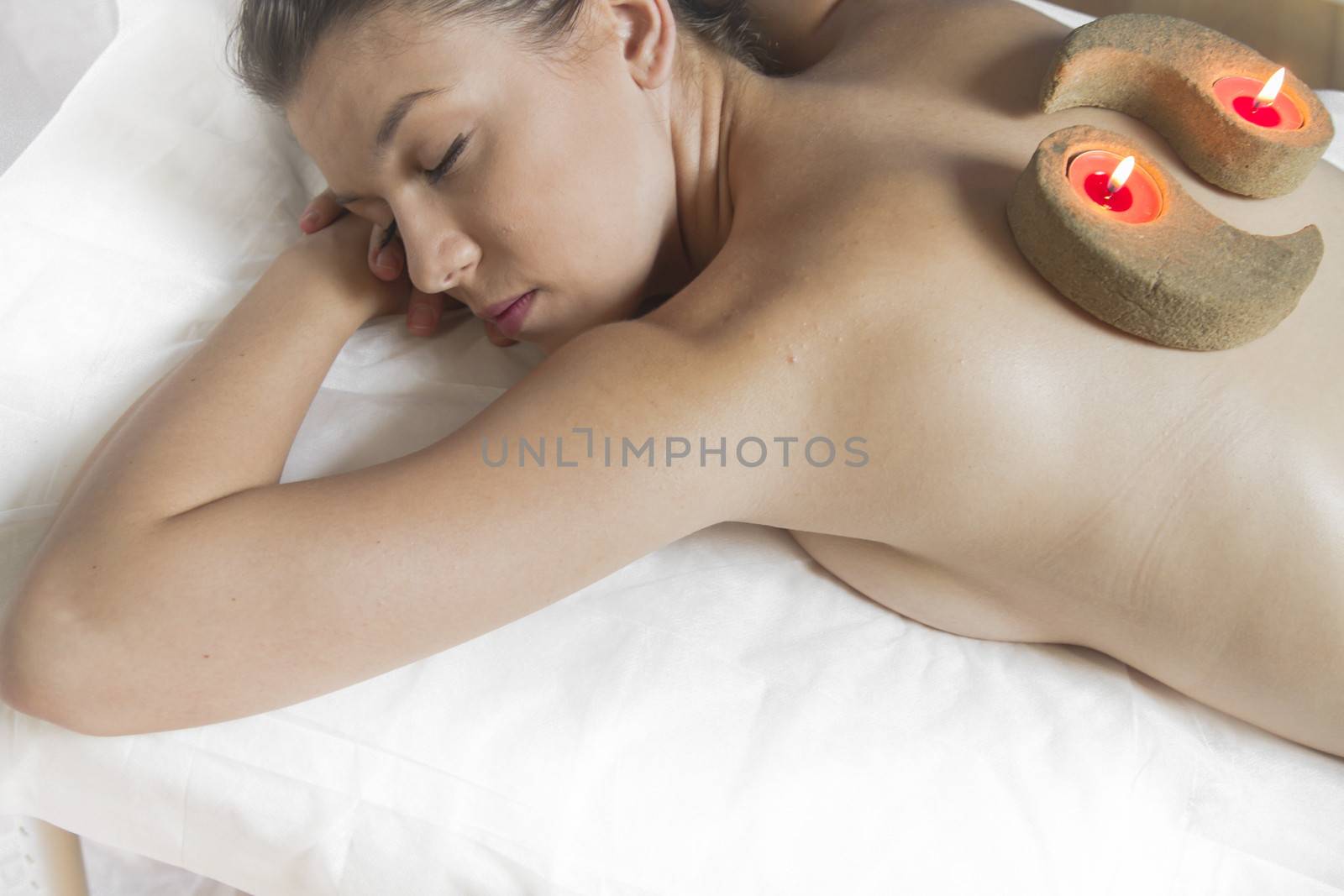 Fresh.portrait of young beautiful woman in spa environment