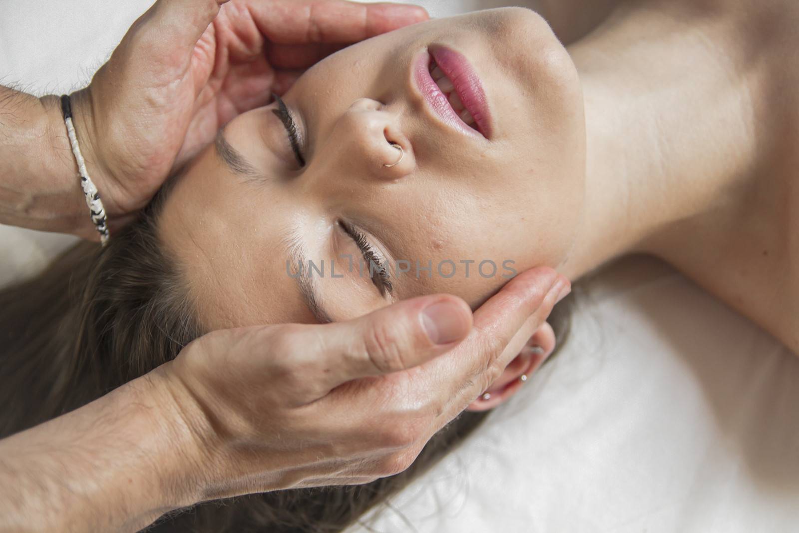 Wellbeing.portrait of young beautiful woman in spa environment