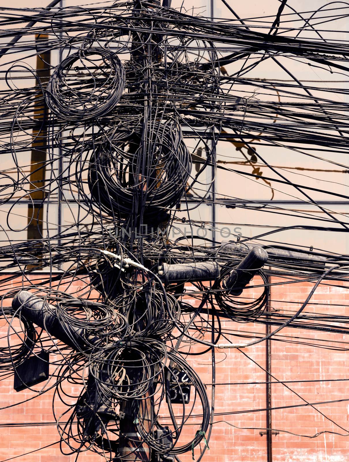 Electric wires on a post in Kathmandu, Nepal