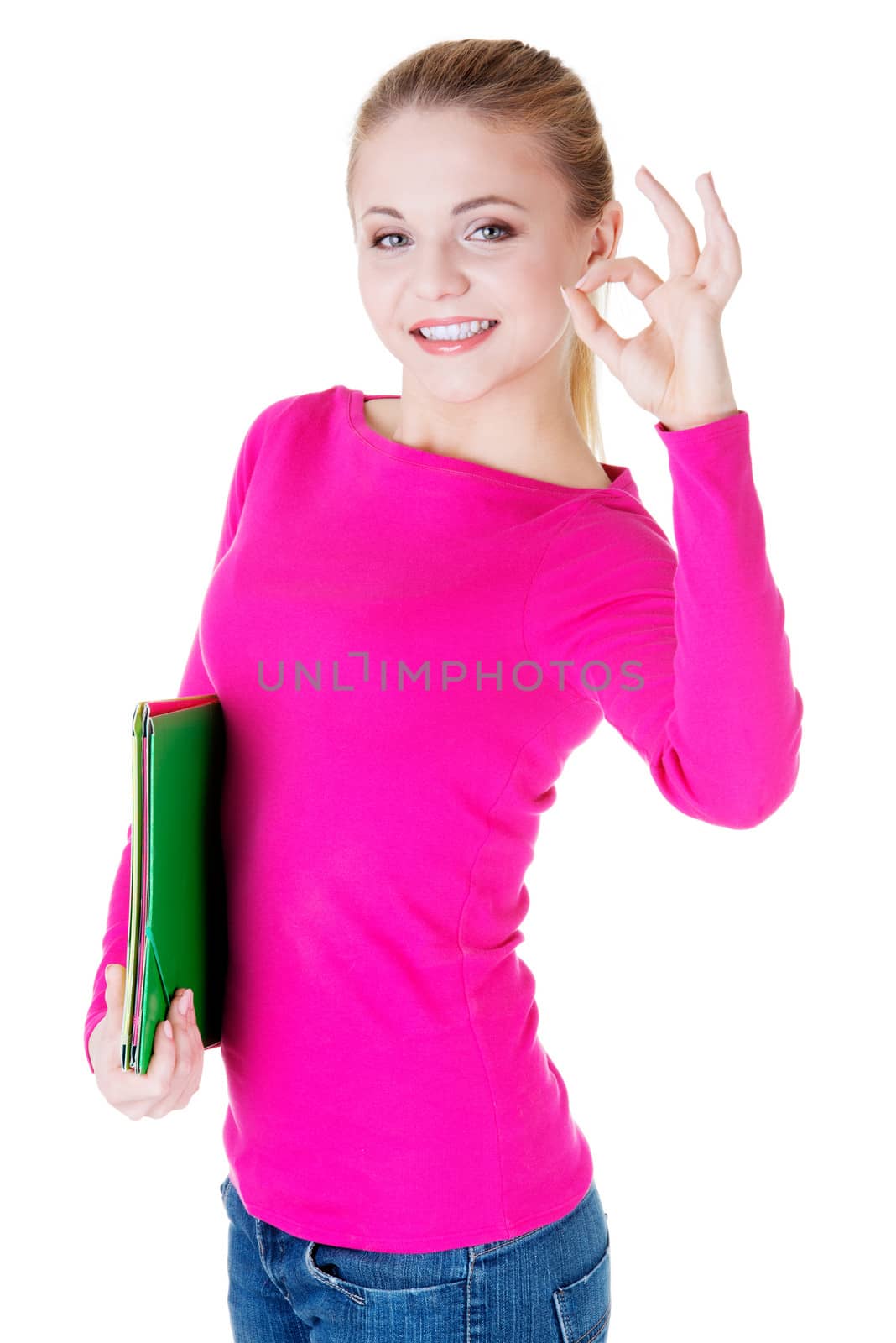 young casual woman student showin OK gesture. by BDS