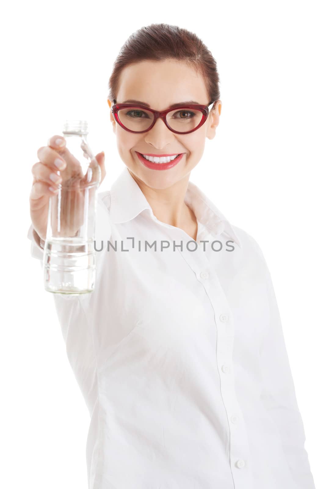 Beautiful business woman with plastic bottle of water. Isolated on white.