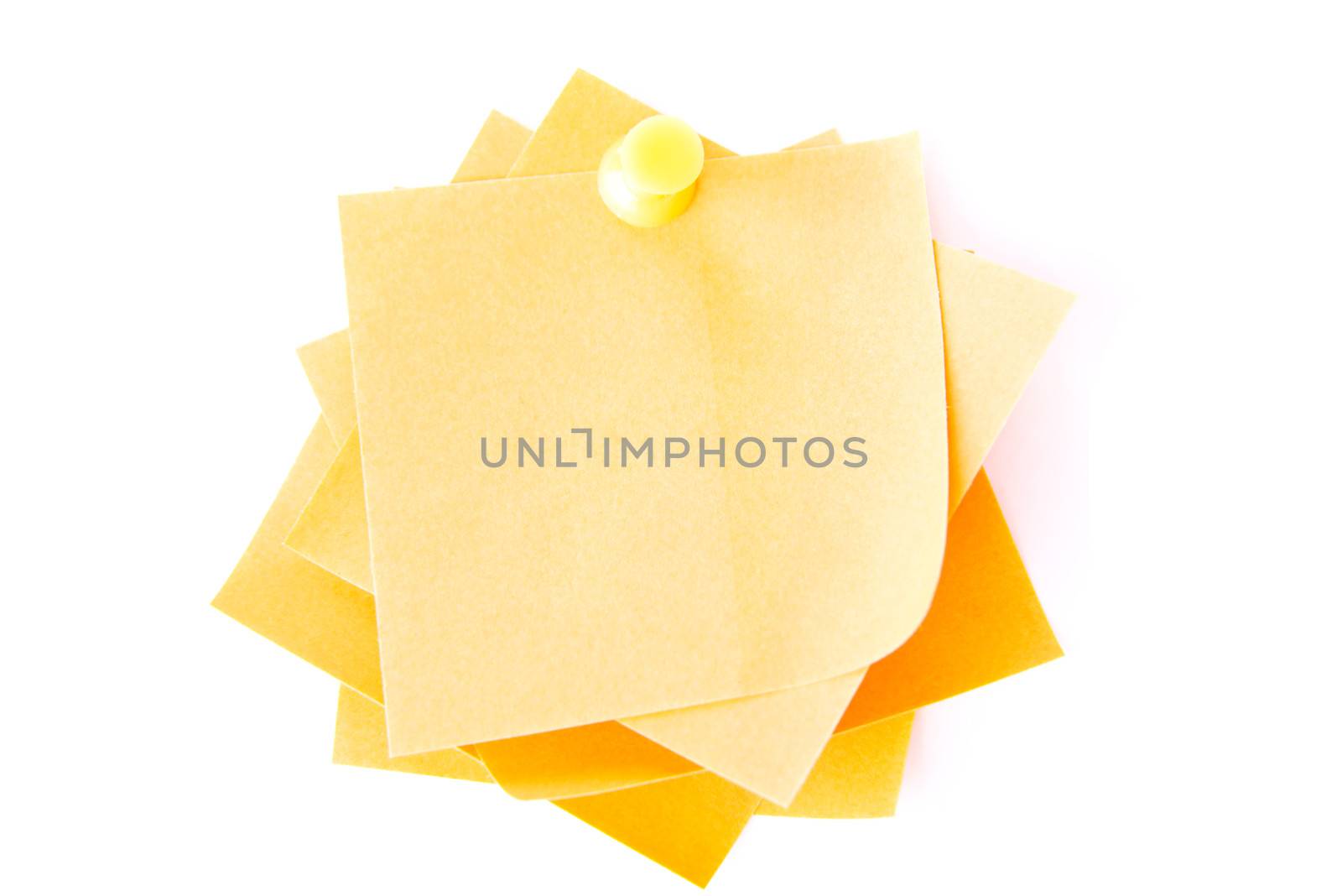 Yellow small memo attached with drawin pin. Isolated on white.