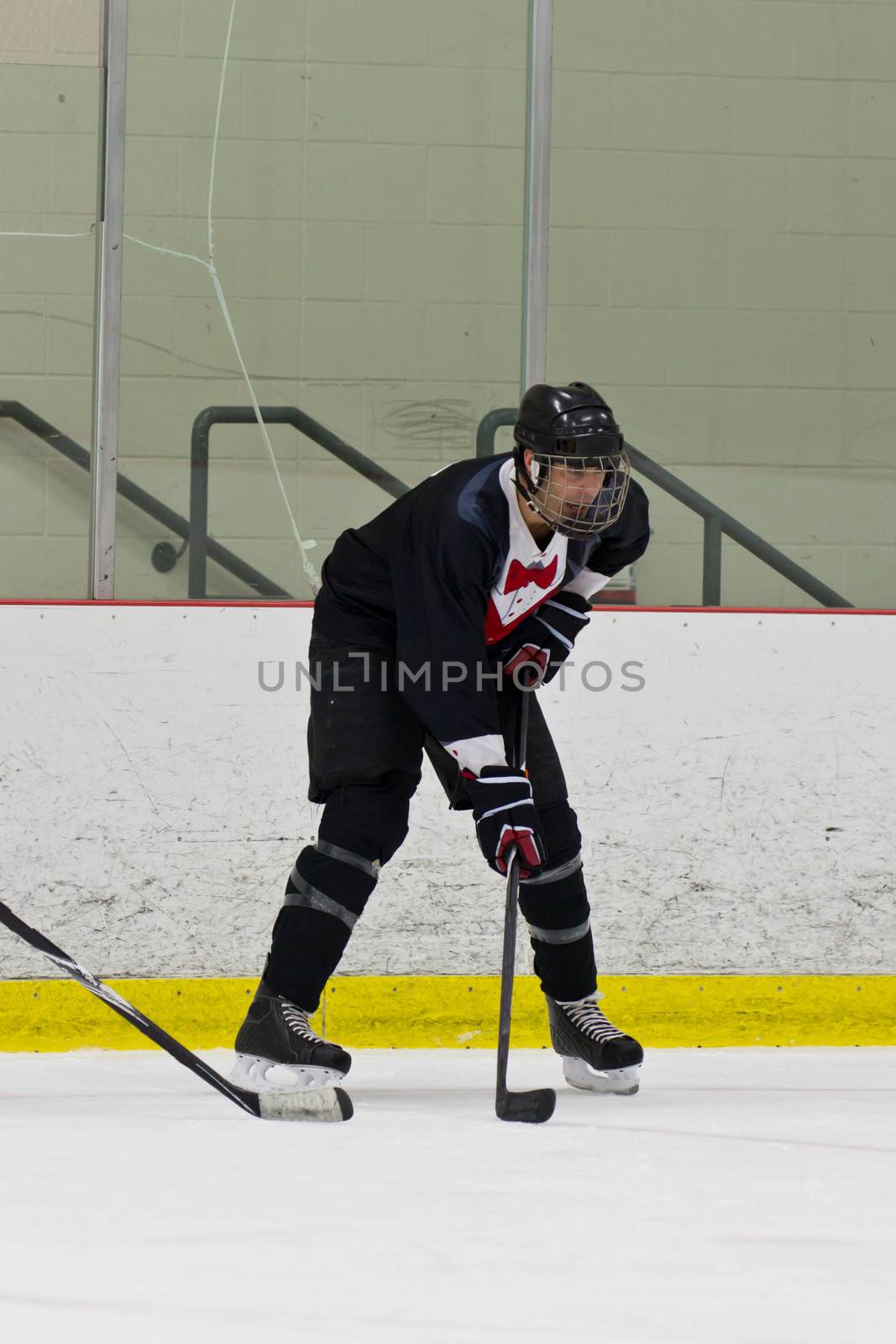 Hockey player ready for the drop of the puck