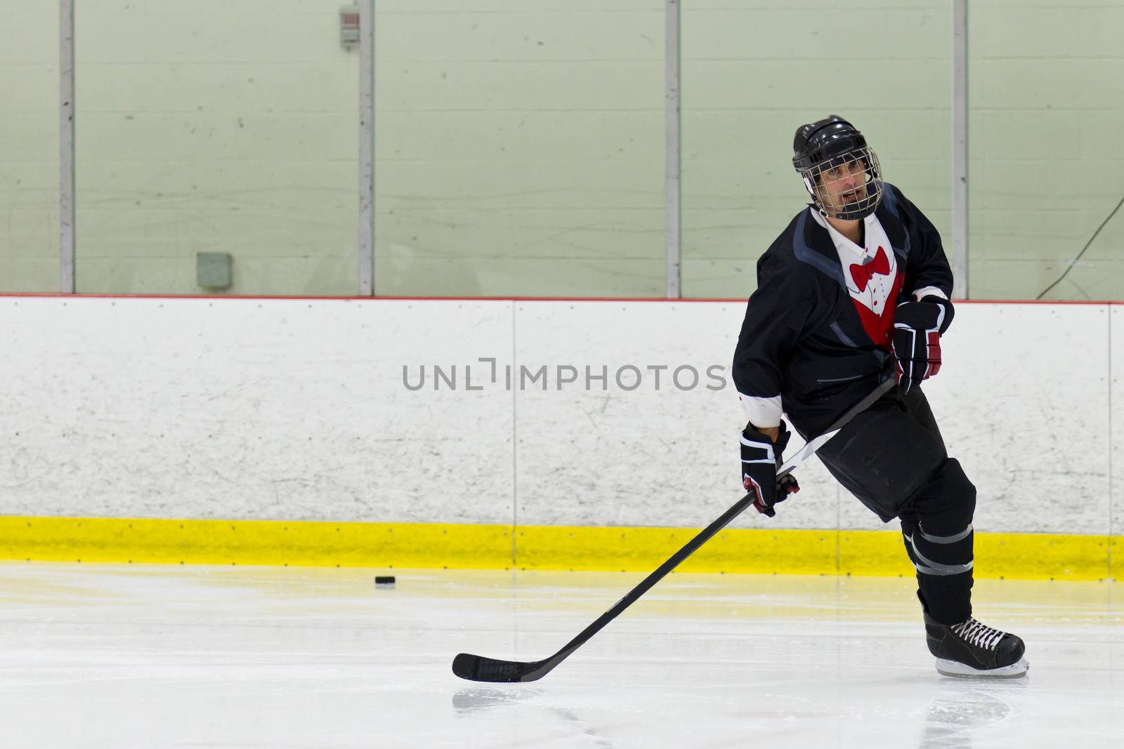 Hockey player warms up for a game