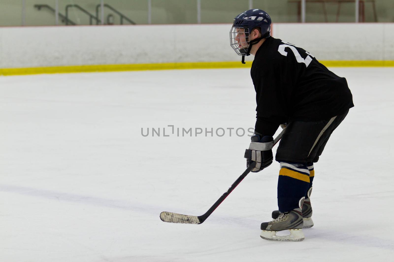 Hockey player patrolling the blue line by bigjohn36