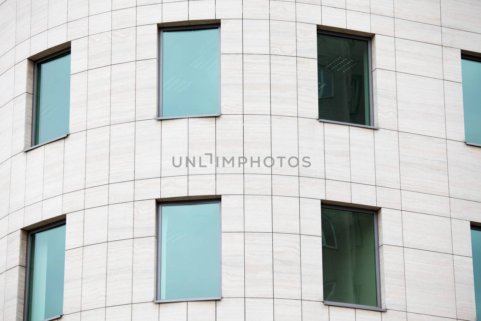 View on a building for offices, with greeny windows. by BDS