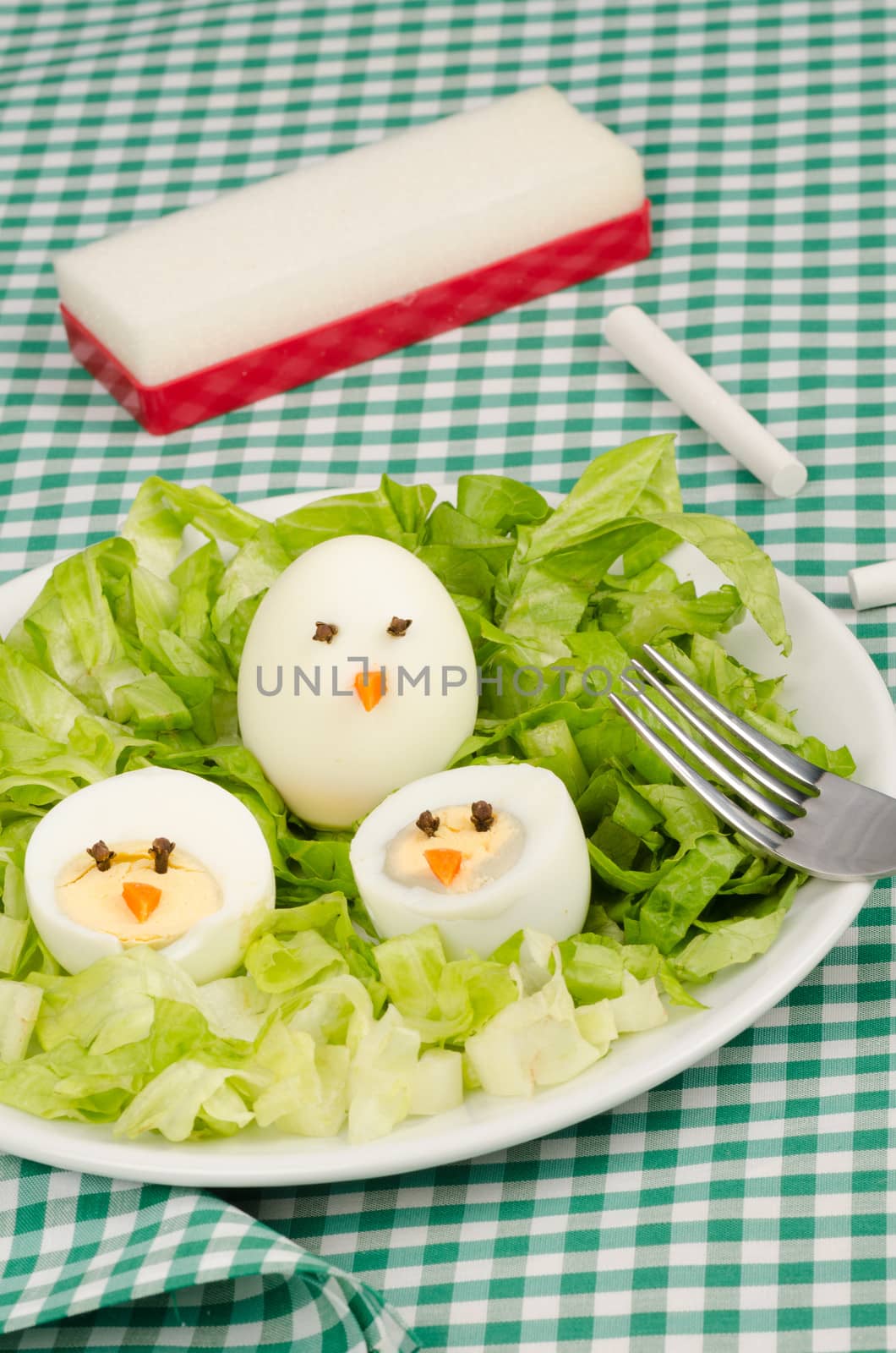 A salad decorated as a nest, funny kid food