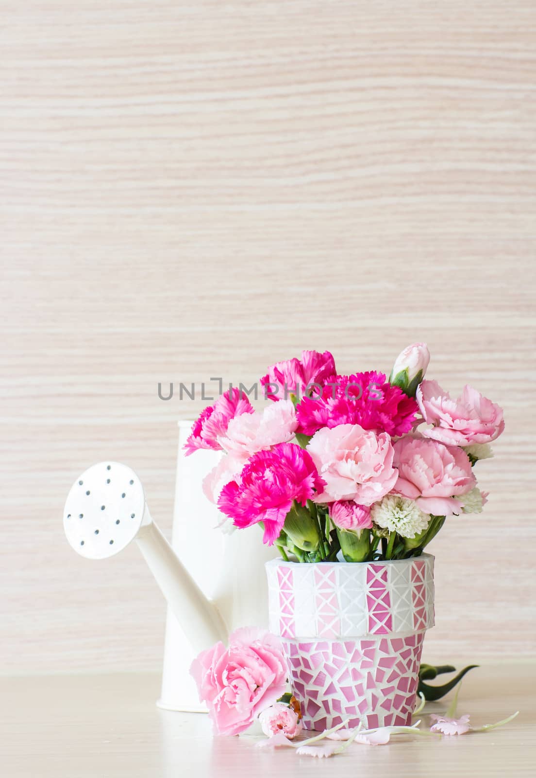 Carnation in mosaic flower pot