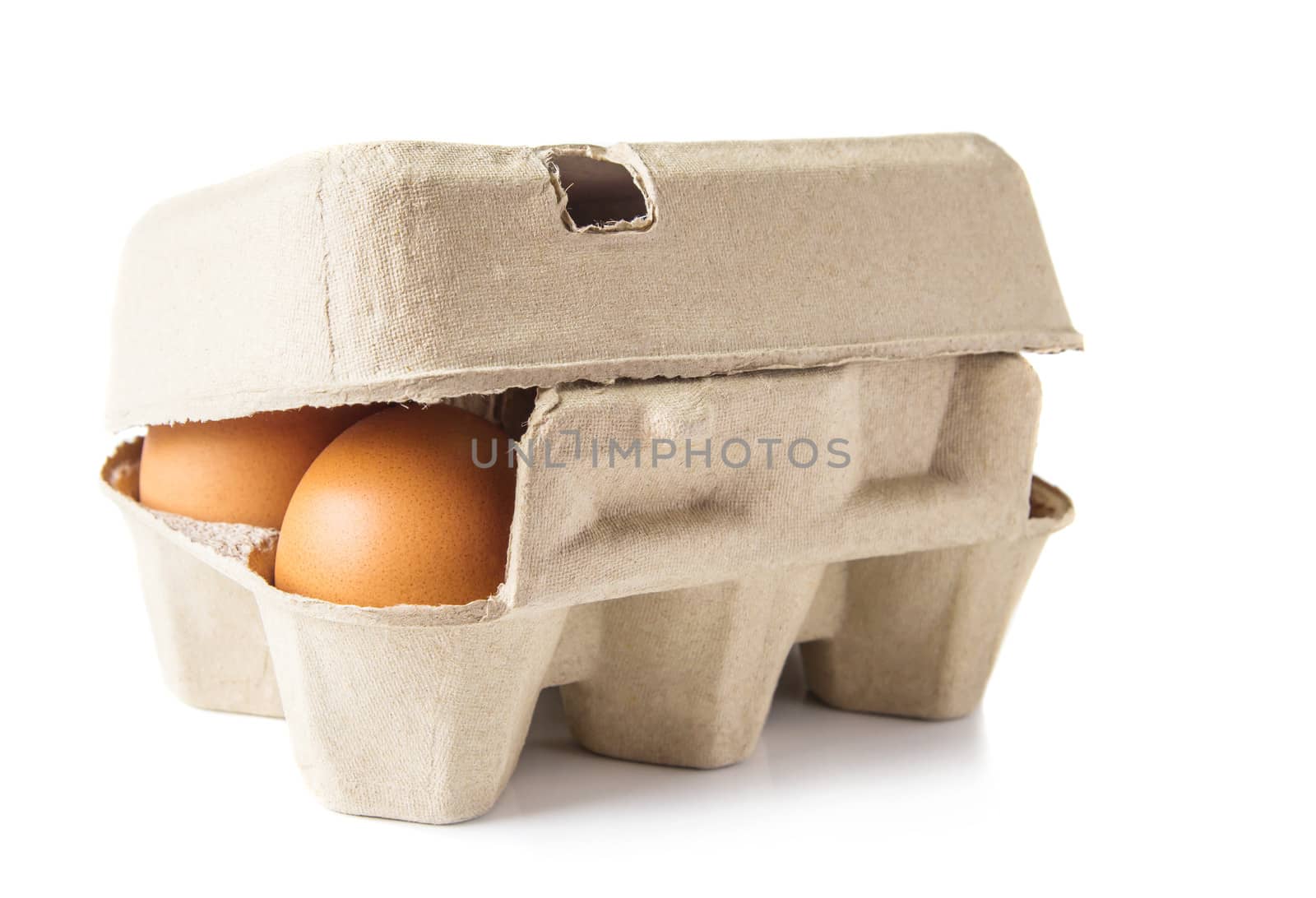 Egg box on white background