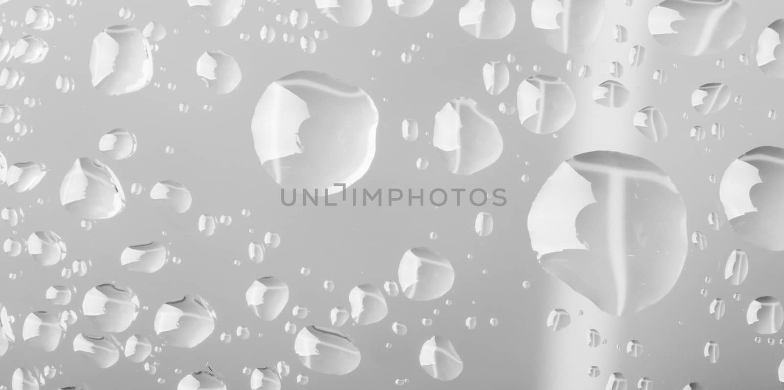 macro of water drops glass by artush