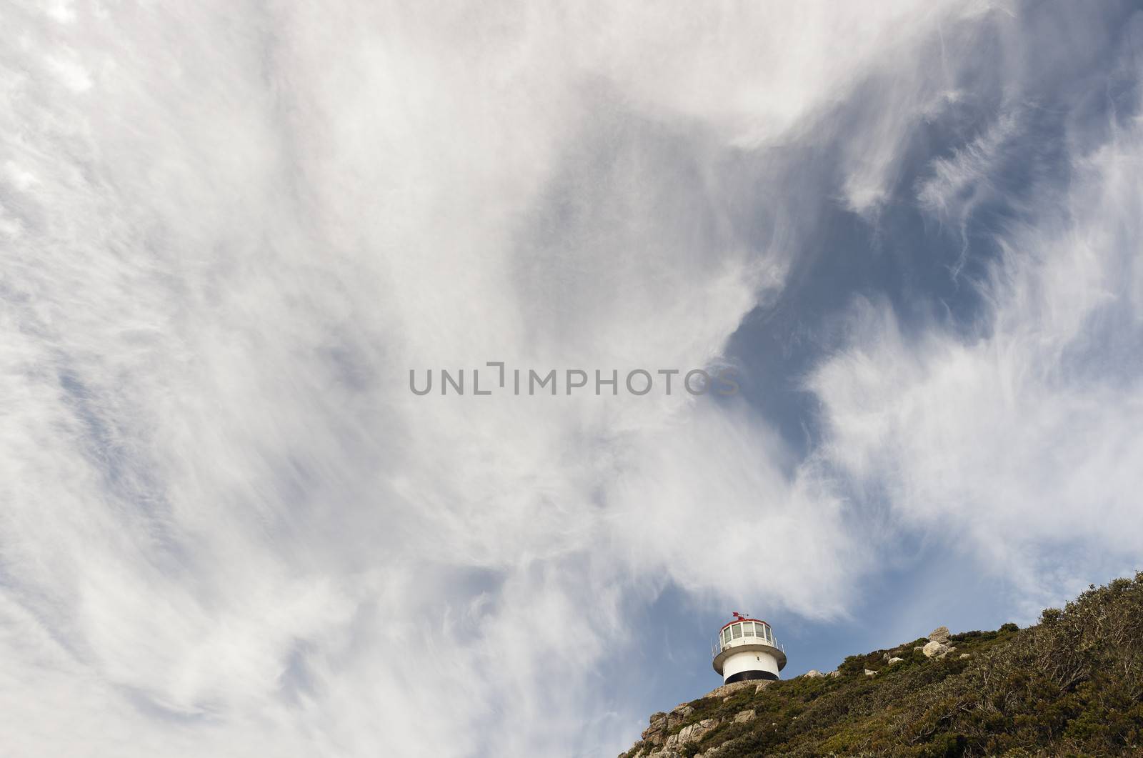 Lighthouse Cape of Good hope and blue sky with white clouds, Cape Town