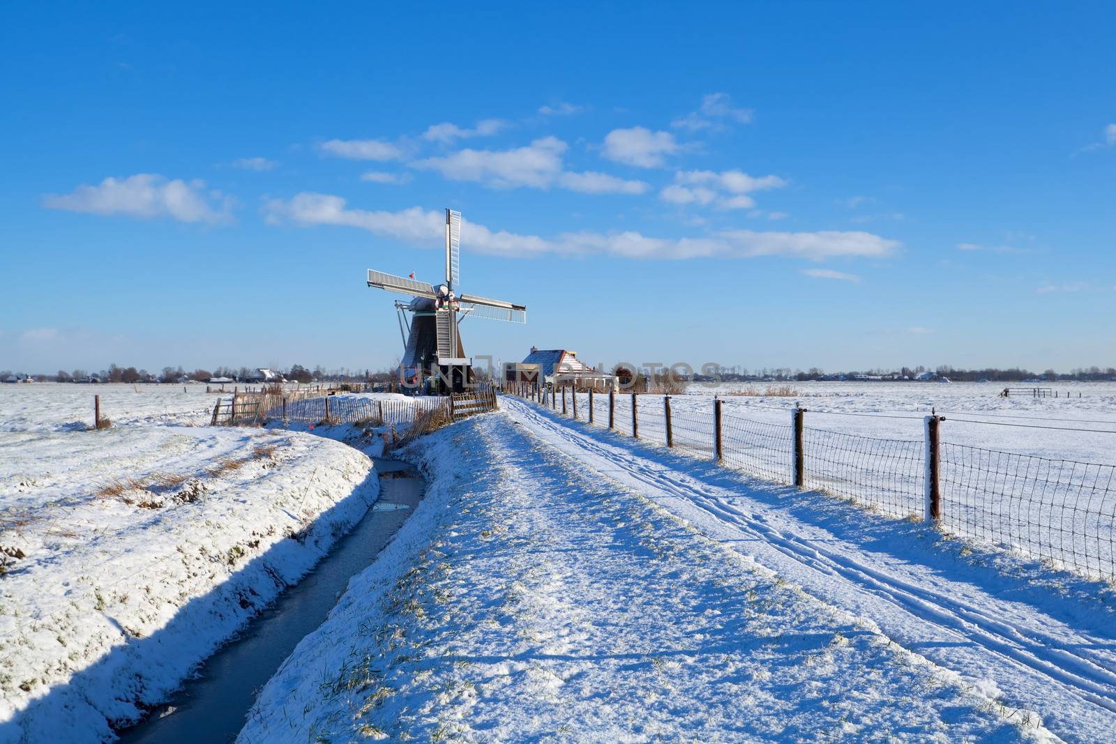 Dutch windmill during snowy winter, Groningen, Netherlands