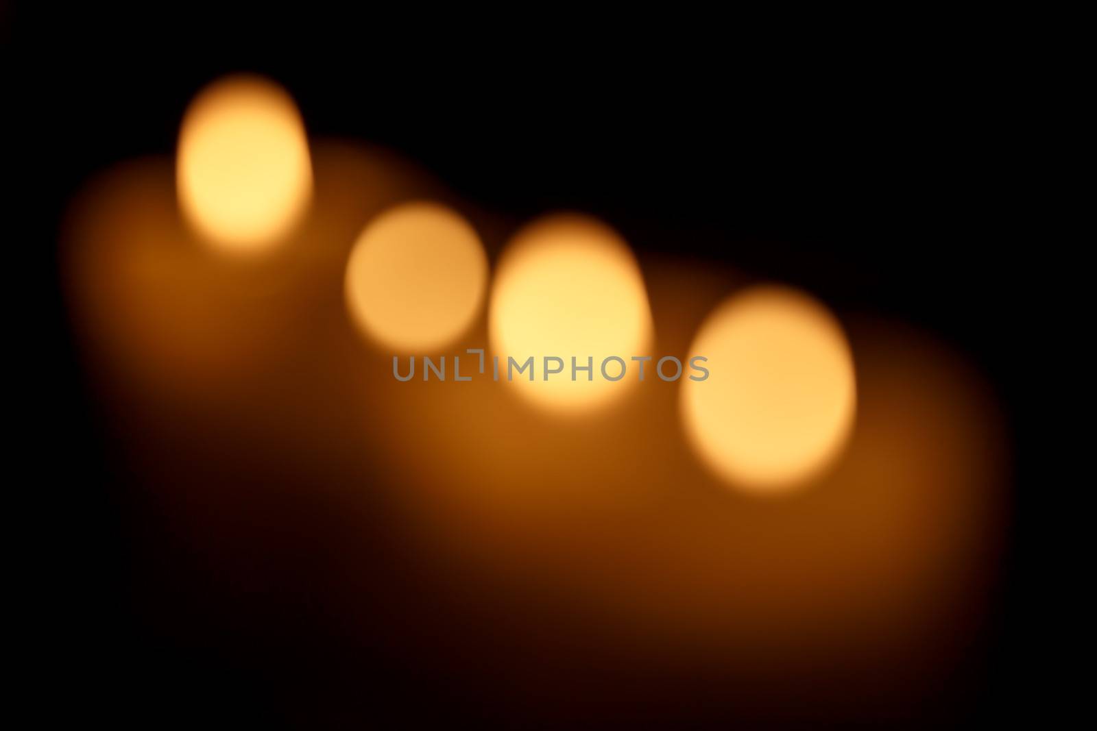Abstract background. Blurred colorful circles bokeh of christmas candles lights 