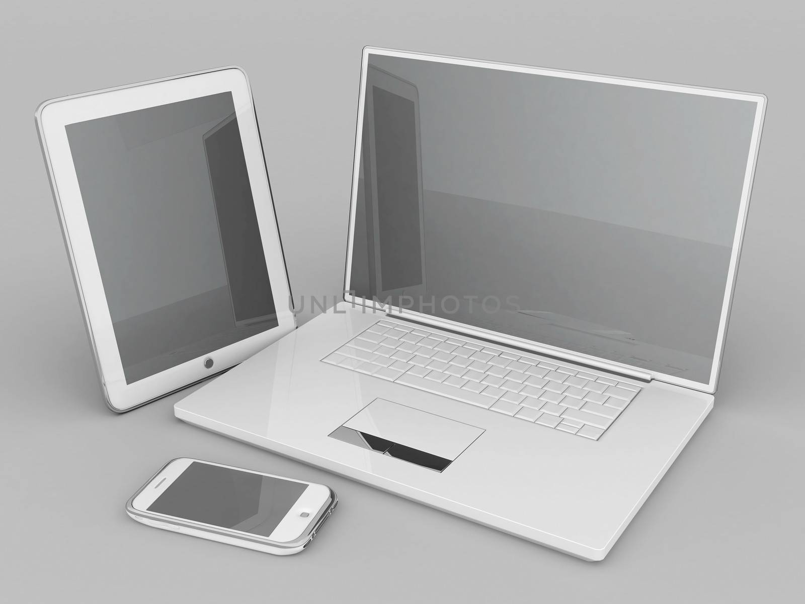 Laptop, tablet and smartphone on a gray background
