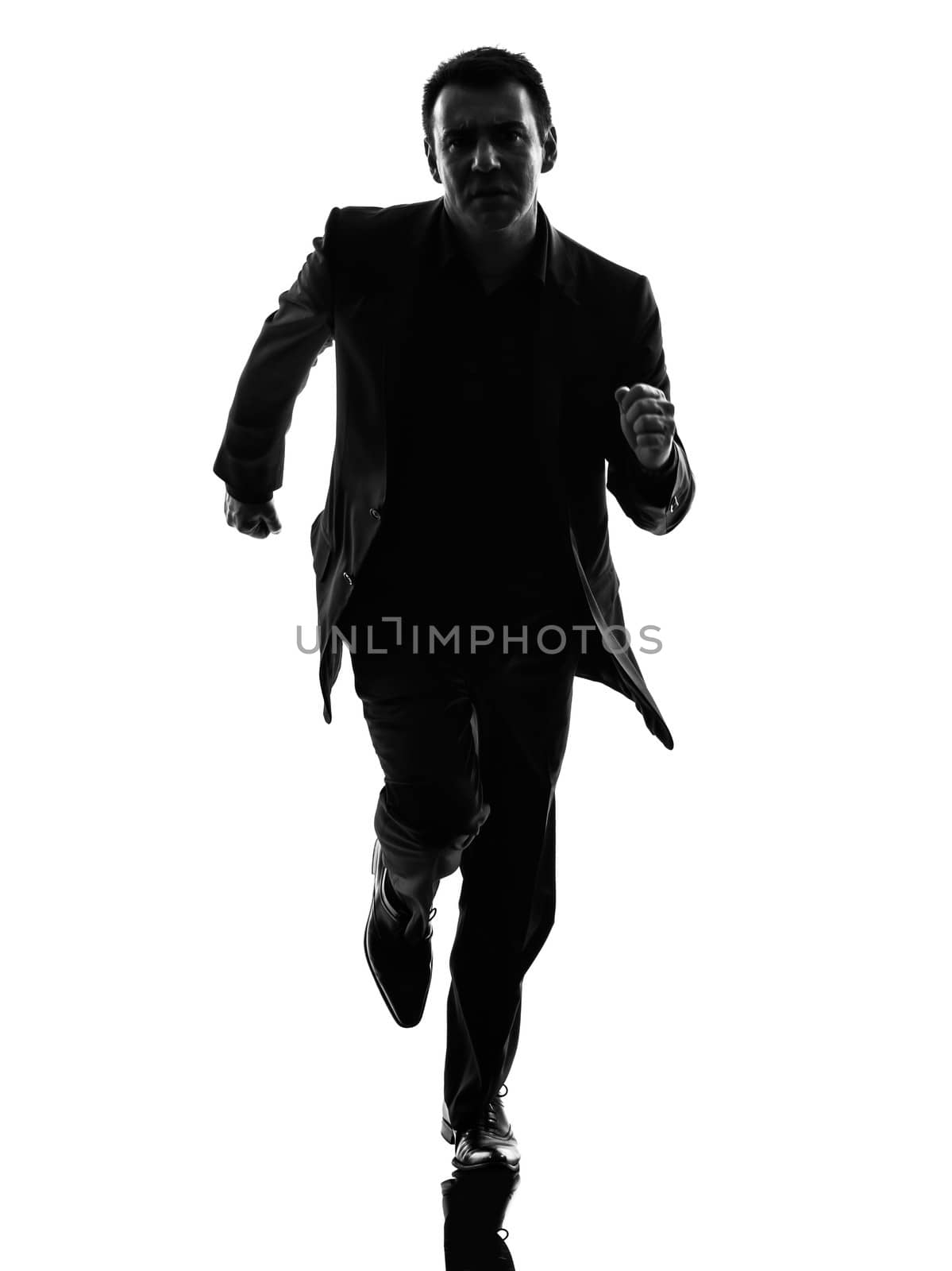 one caucasian business man running in silhouette  on white background