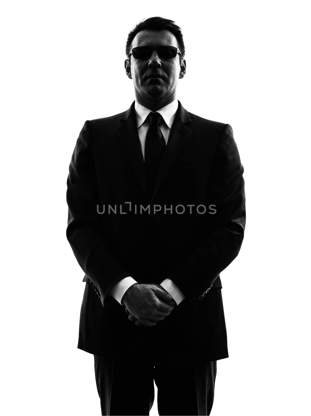 one secret service security bodyguard agent  man in silhouette  on white background