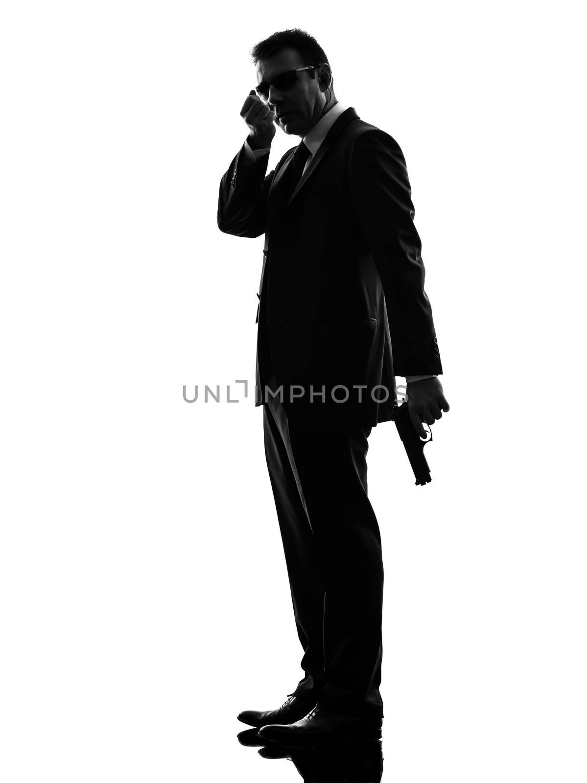 one secret service security bodyguard agent  man in silhouette  on white background