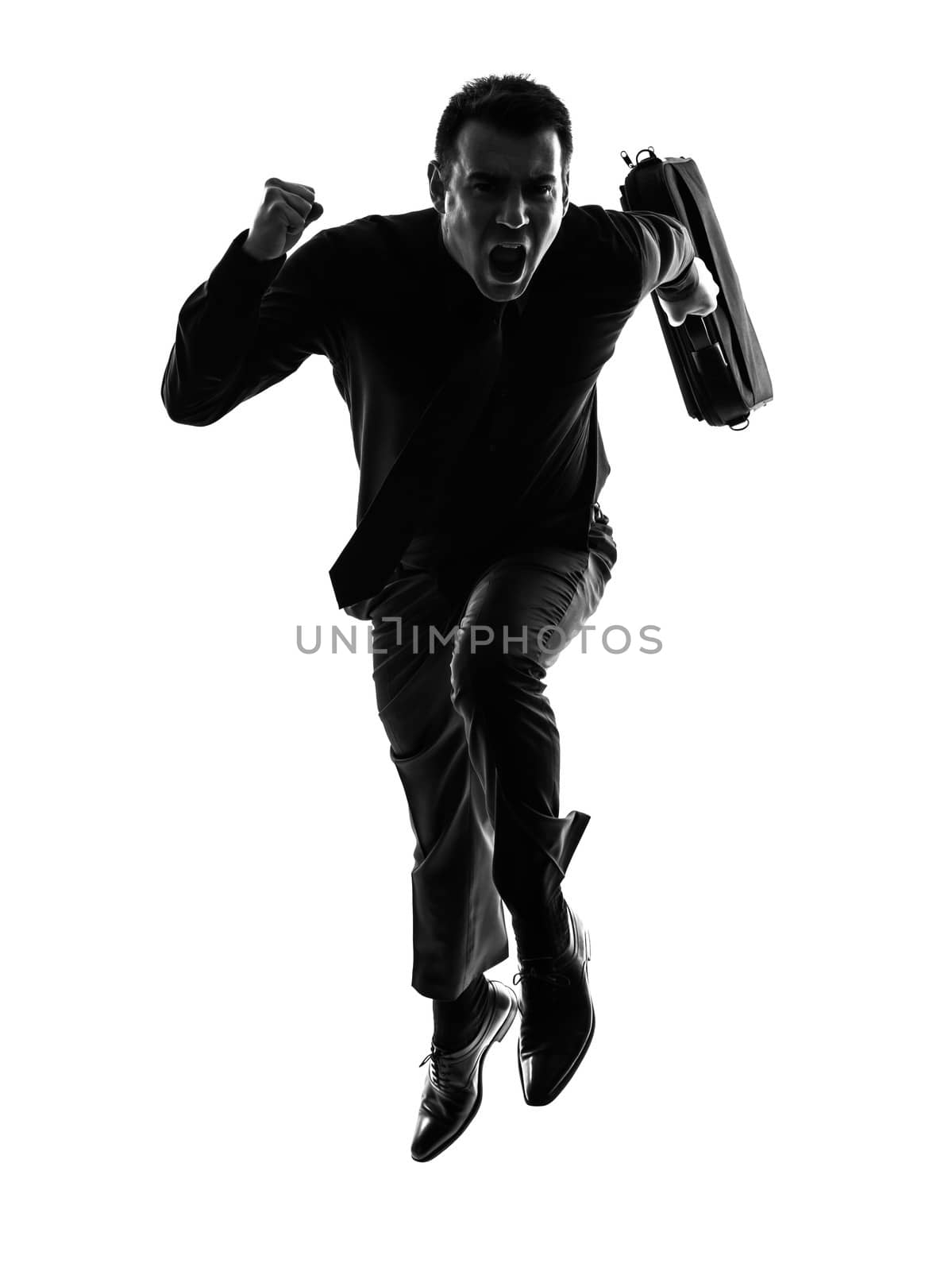 one caucasian business man running in silhouette  on white background