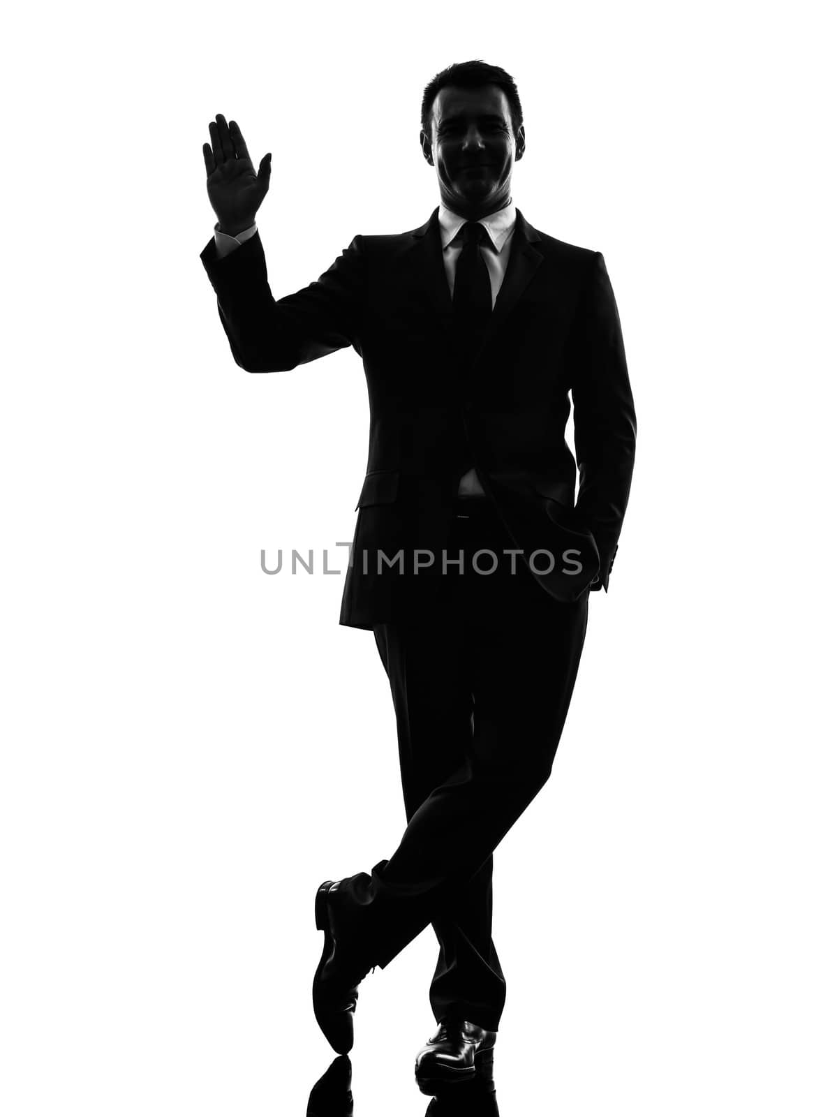 one caucasian business man saluting  in silhouette  on white background