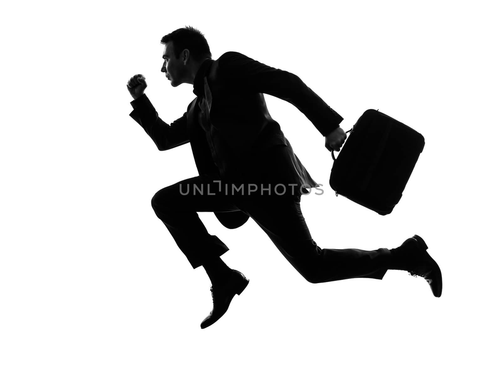 one caucasian business man running in silhouette  on white background