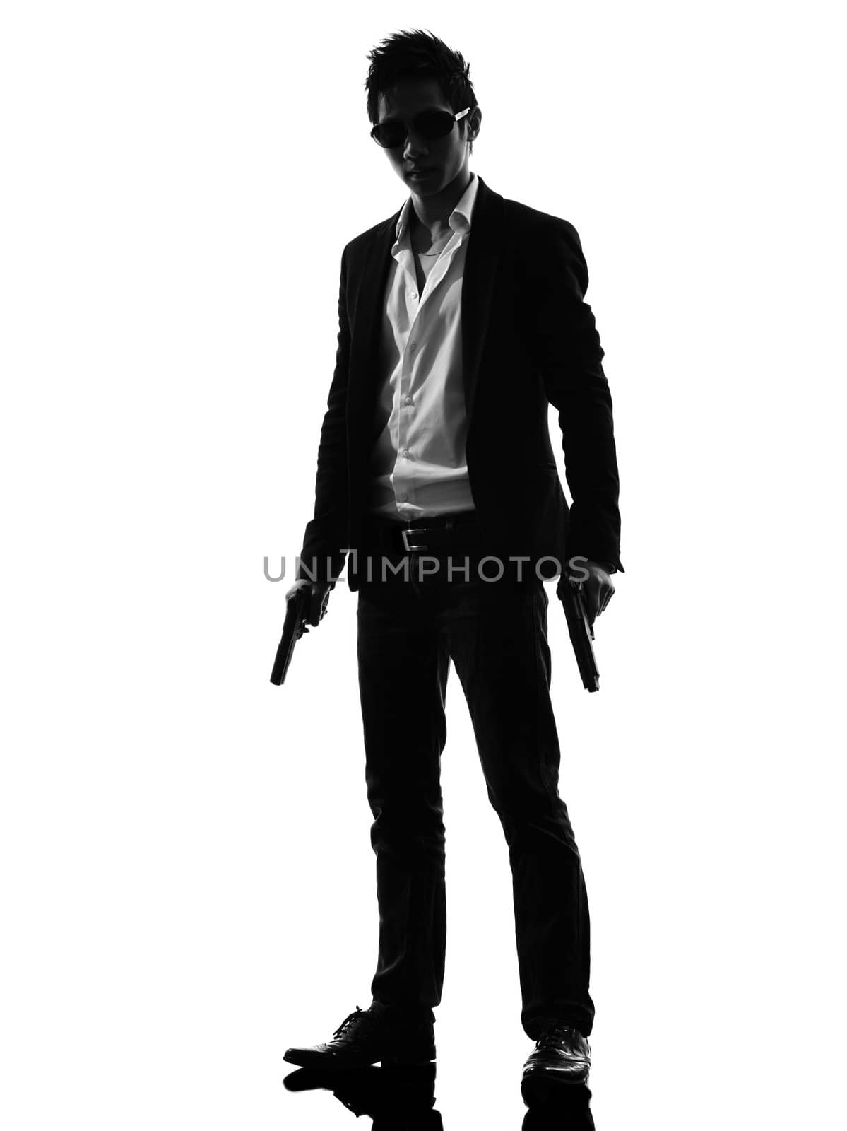 one asian gunman killer  standing in silhouette isolated white background
