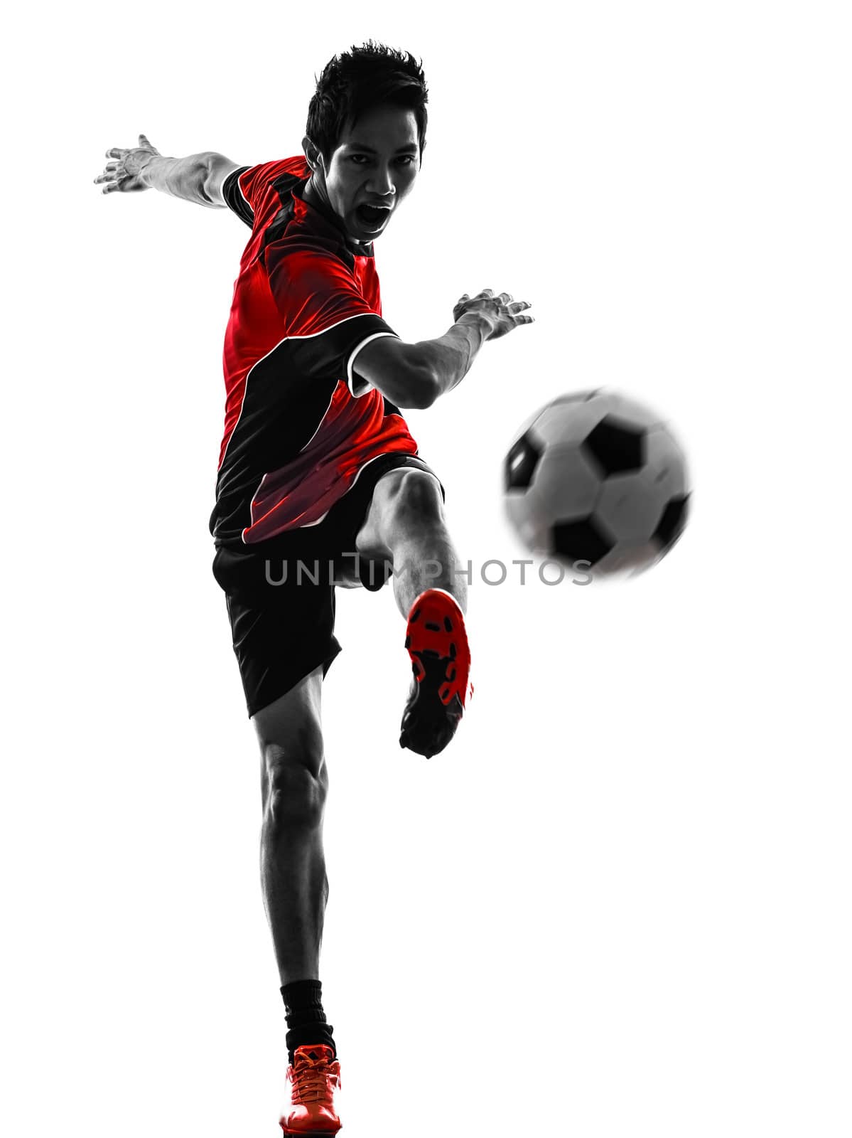one asian soccer player young man kicking in silhouette isolated white background