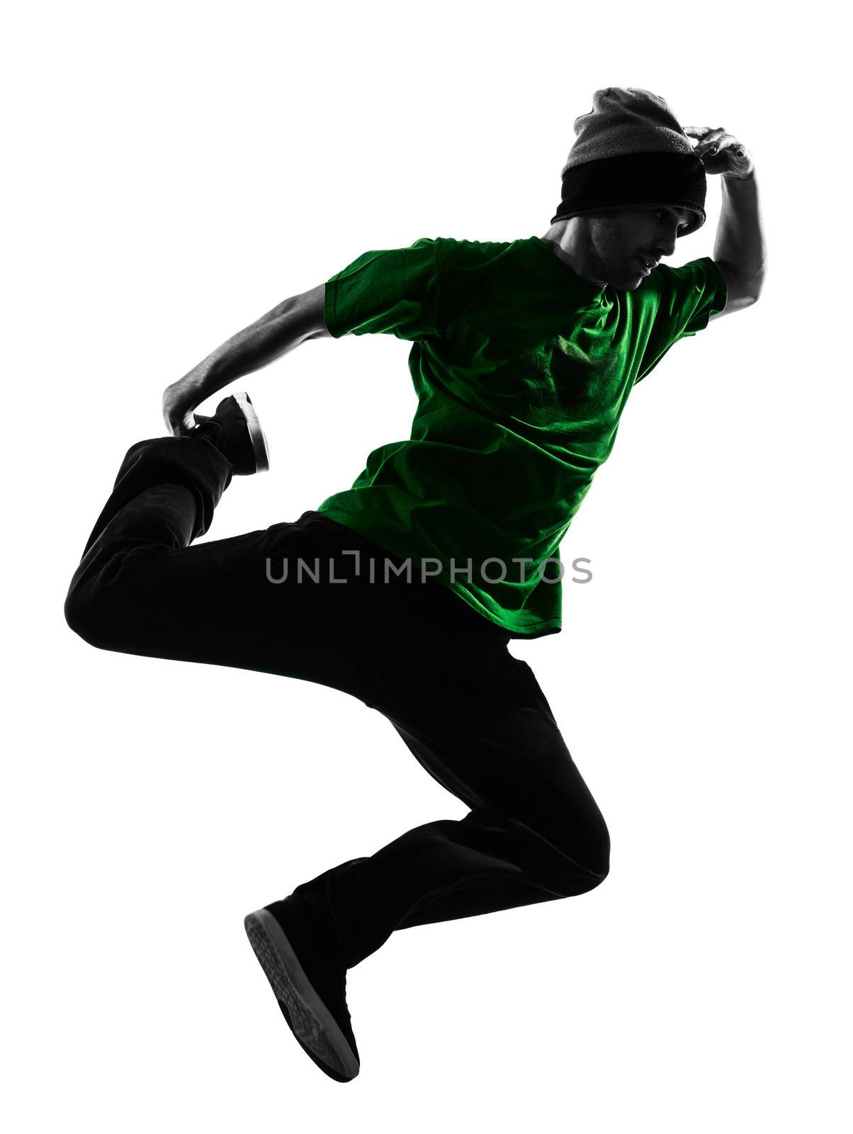 one caucasian young acrobatic break dancer breakdancing man in silhouette  white background