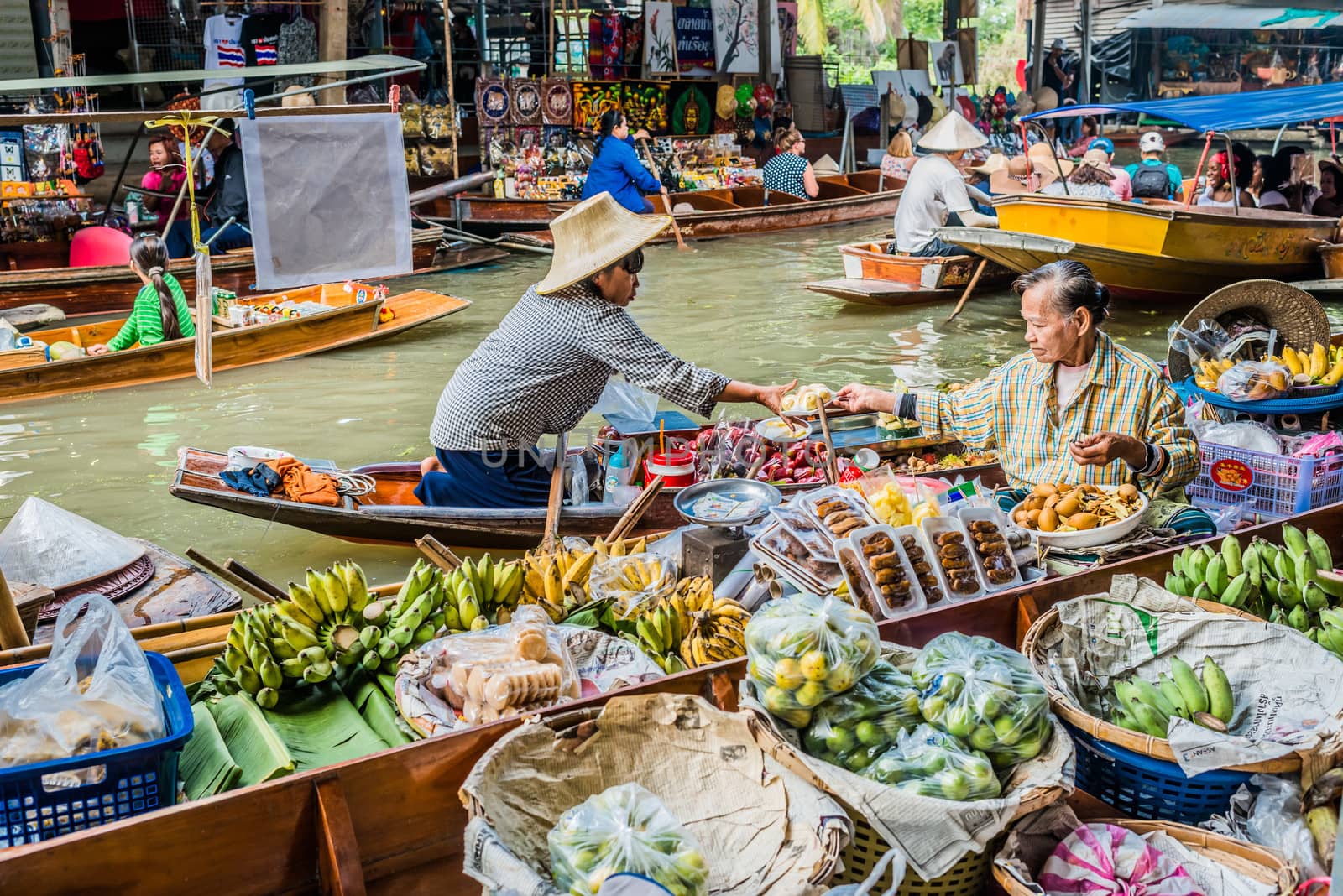 Bangkok, Thailand - December 30, 2013: people at Amphawa Bangkok floating market at Bangkok, Thailand on december 30th, 2013