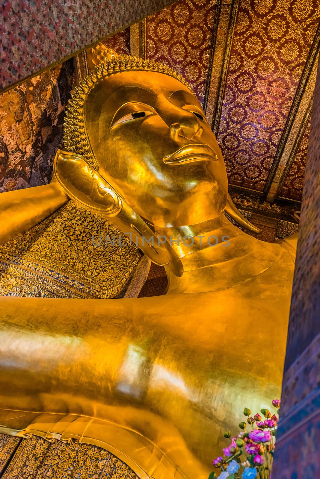 reclining buddha portrait at Wat Pho temple Bangkok Thailand