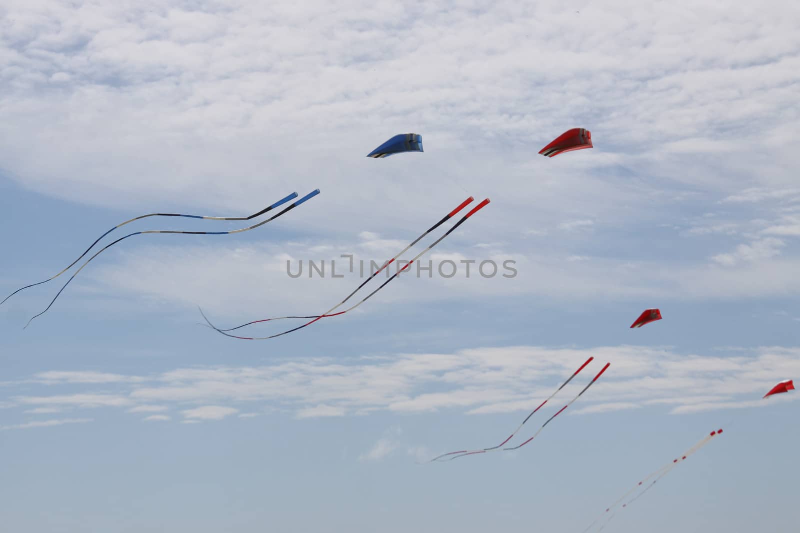 Kites against a blue sky.