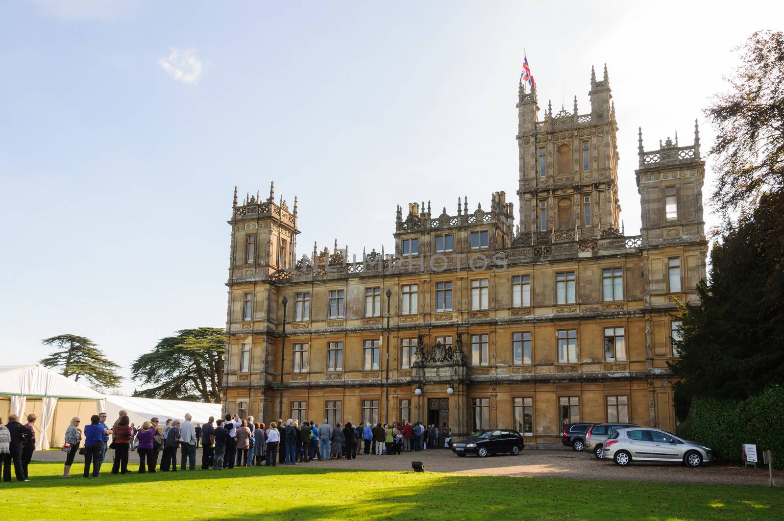 NEWBURY, UK - CIRCA OCTOBER 2011: People  queuing to visit Highclere Castle which  is the main setting for the ITV period drama Downton Abbey.