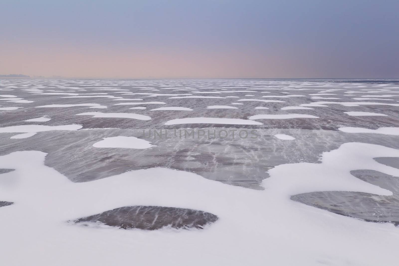 snow and wind texture on frozen Ijsselmeer lake by catolla