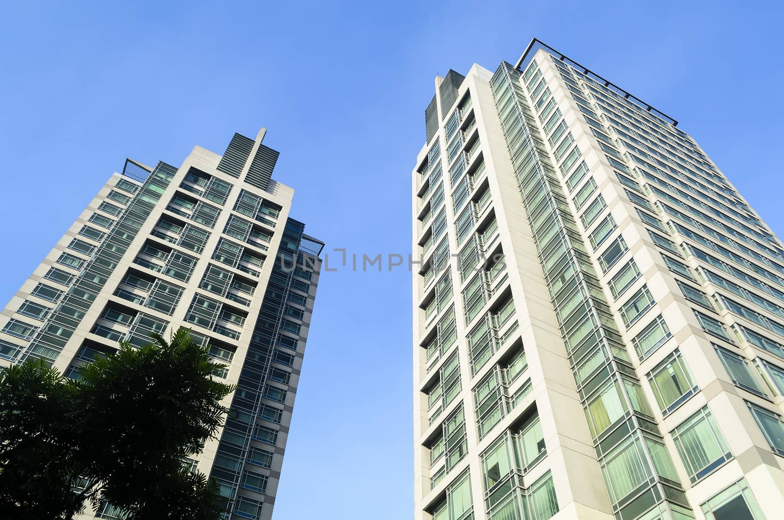 Worm's eye view of two residential buildings