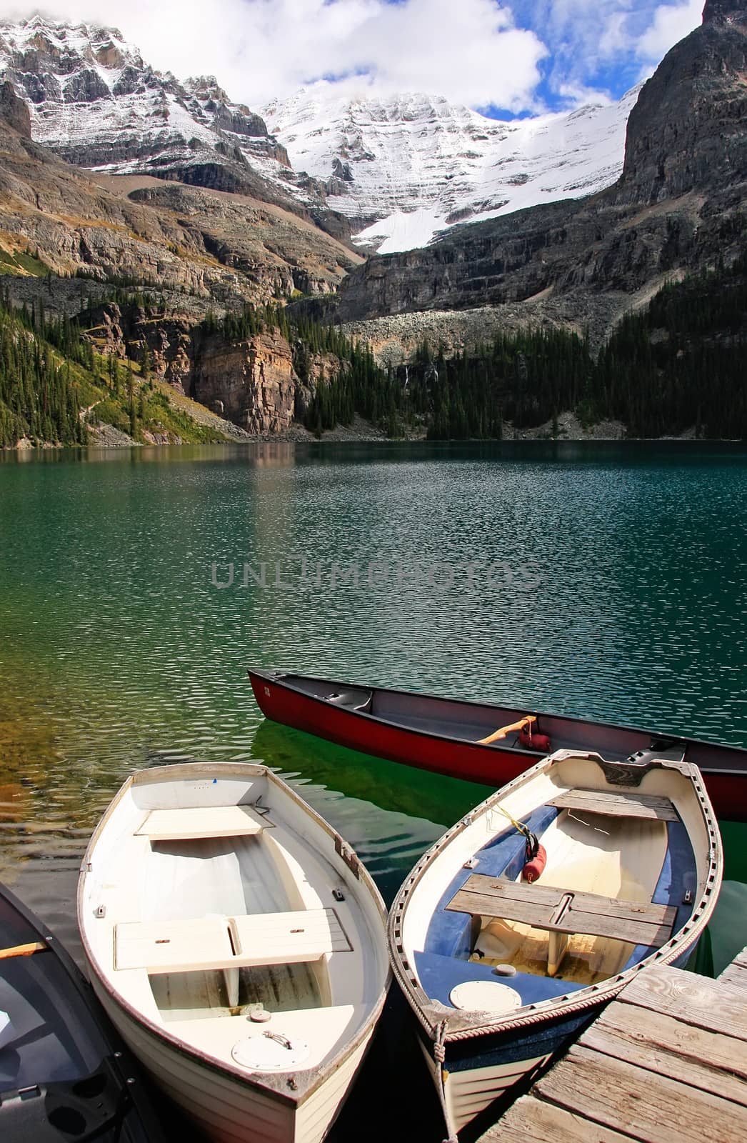 Wooden boats at Lake O'Hara, Yoho National Park, Canada by donya_nedomam