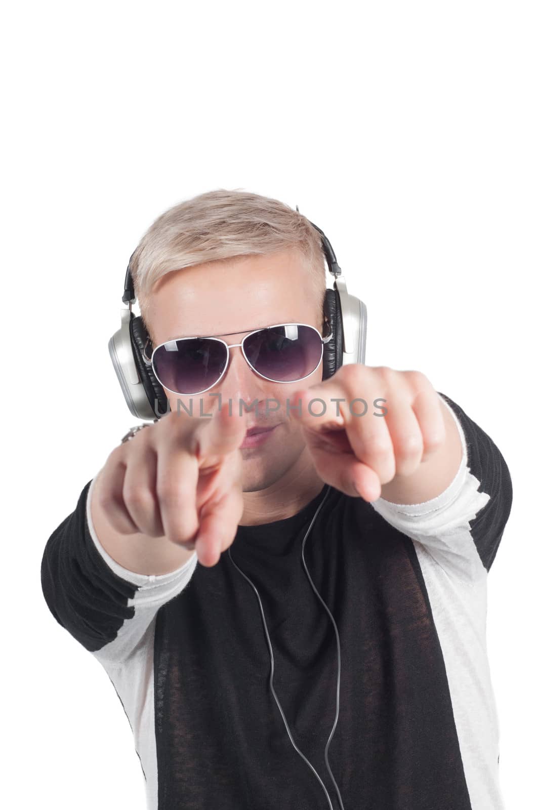 Man with headphones and sunglasses pointing his fingers