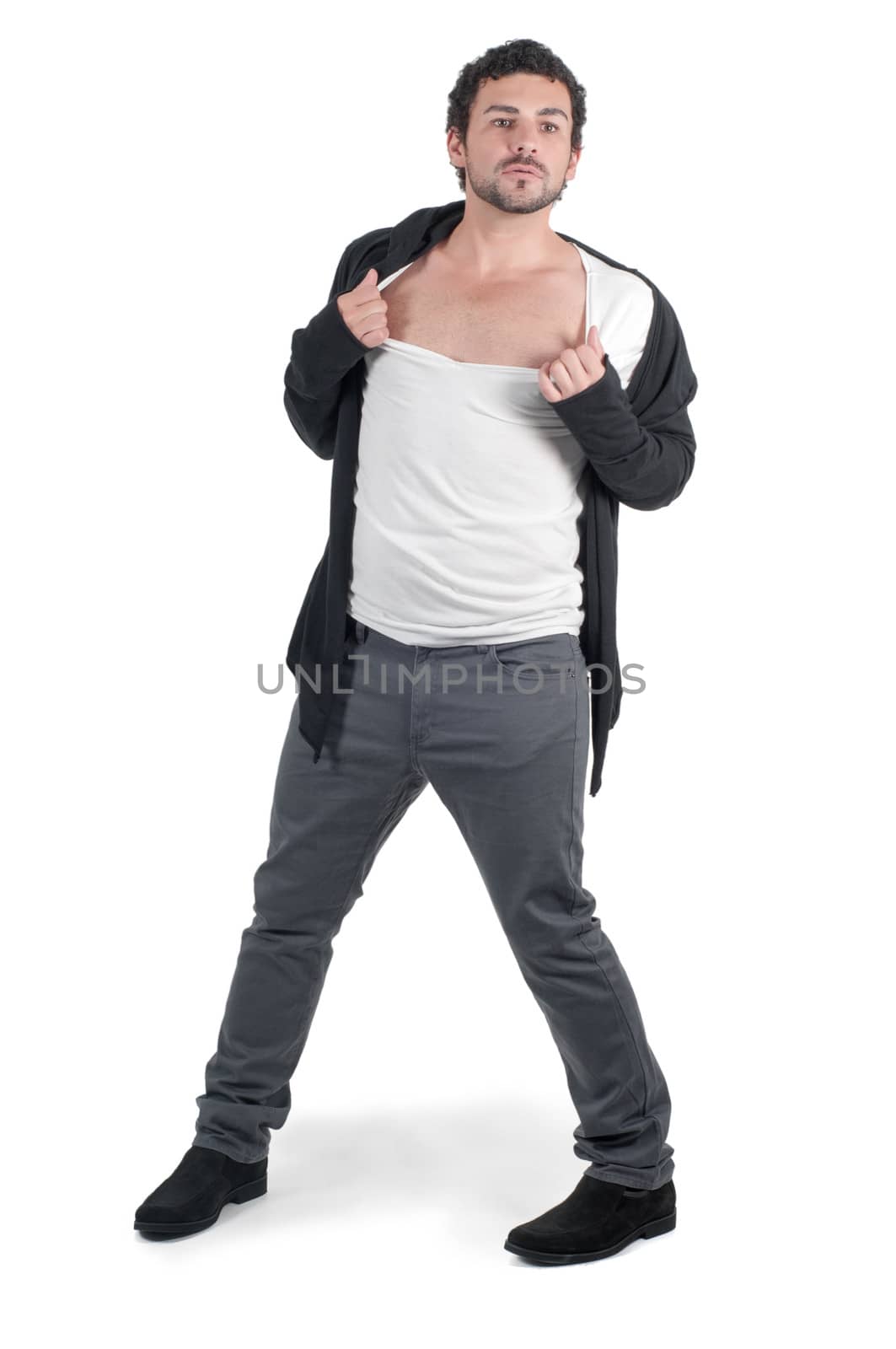 Man man ripping his shirt, isolated on white