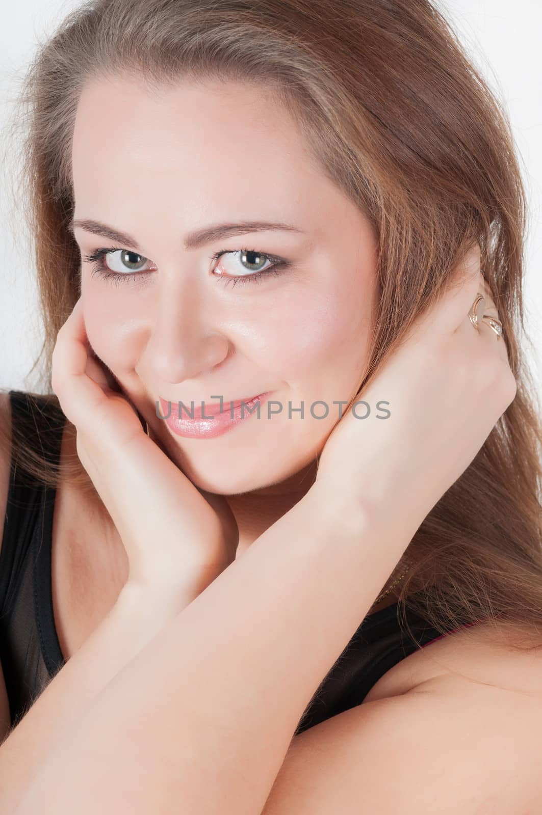 Cheerful young woman with fresh clear skin