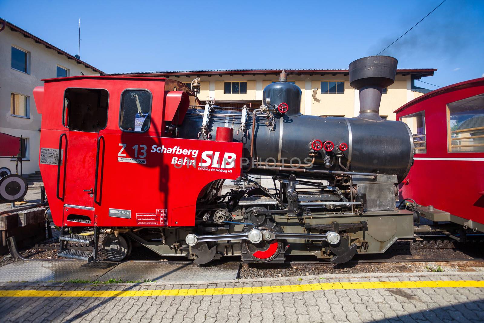 ST. WOLFGANG, AUSTRIA - AUGUST 6: Steam locomotive of a vintage cogwheel railway going to Schafberg Peak (1783m) on August 6, 2013 in St. Wolfgang.