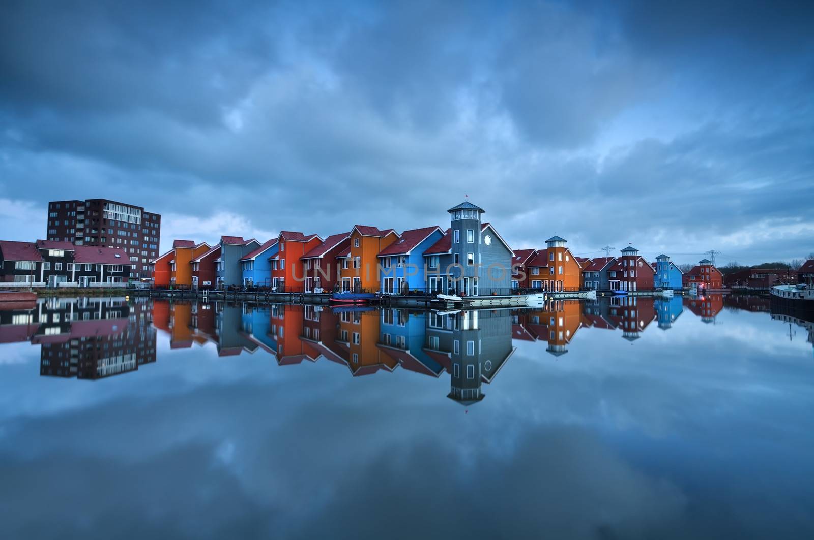 colorful buildings on water in Groningen, Reitdiephaven, Netherlands