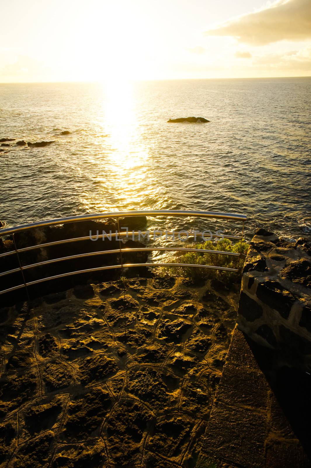 Sunrise on a Pier over Atlantic Ocean in Tenerife Canary Islands Spain