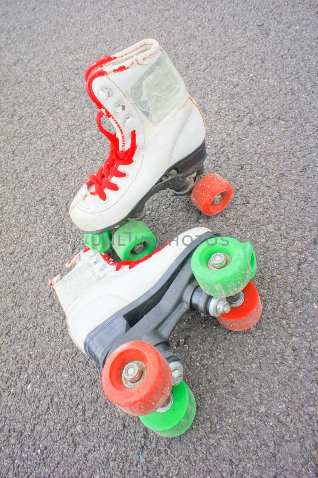 Hdr Picture of Old Vintage White Skate Boot on the Asphalt Sterret