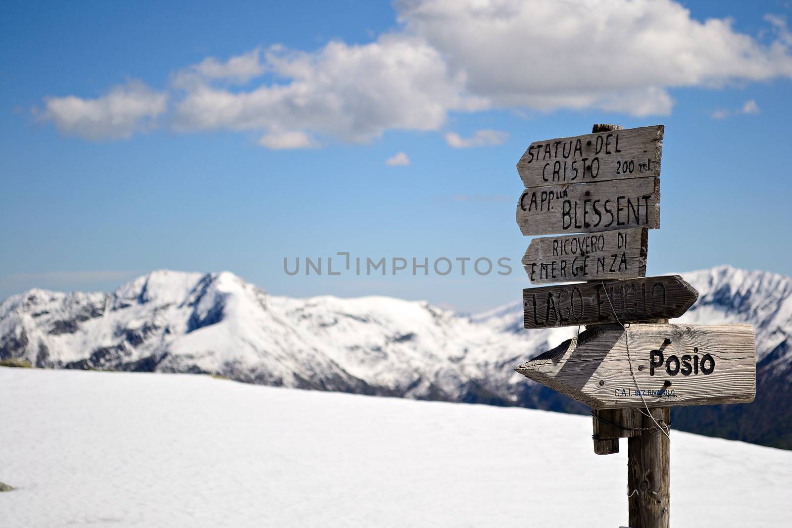 Footpath's signposts in scenic high mountain landscape, italian Alps