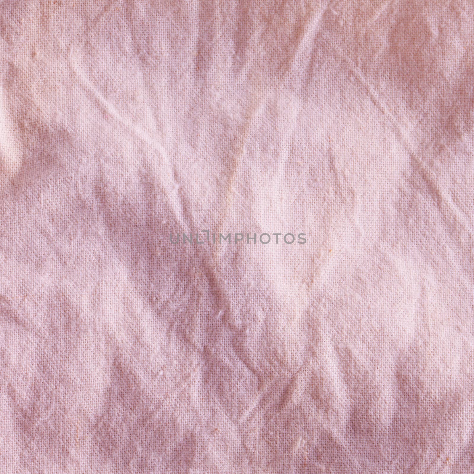 A light beige jute background, in strict close up