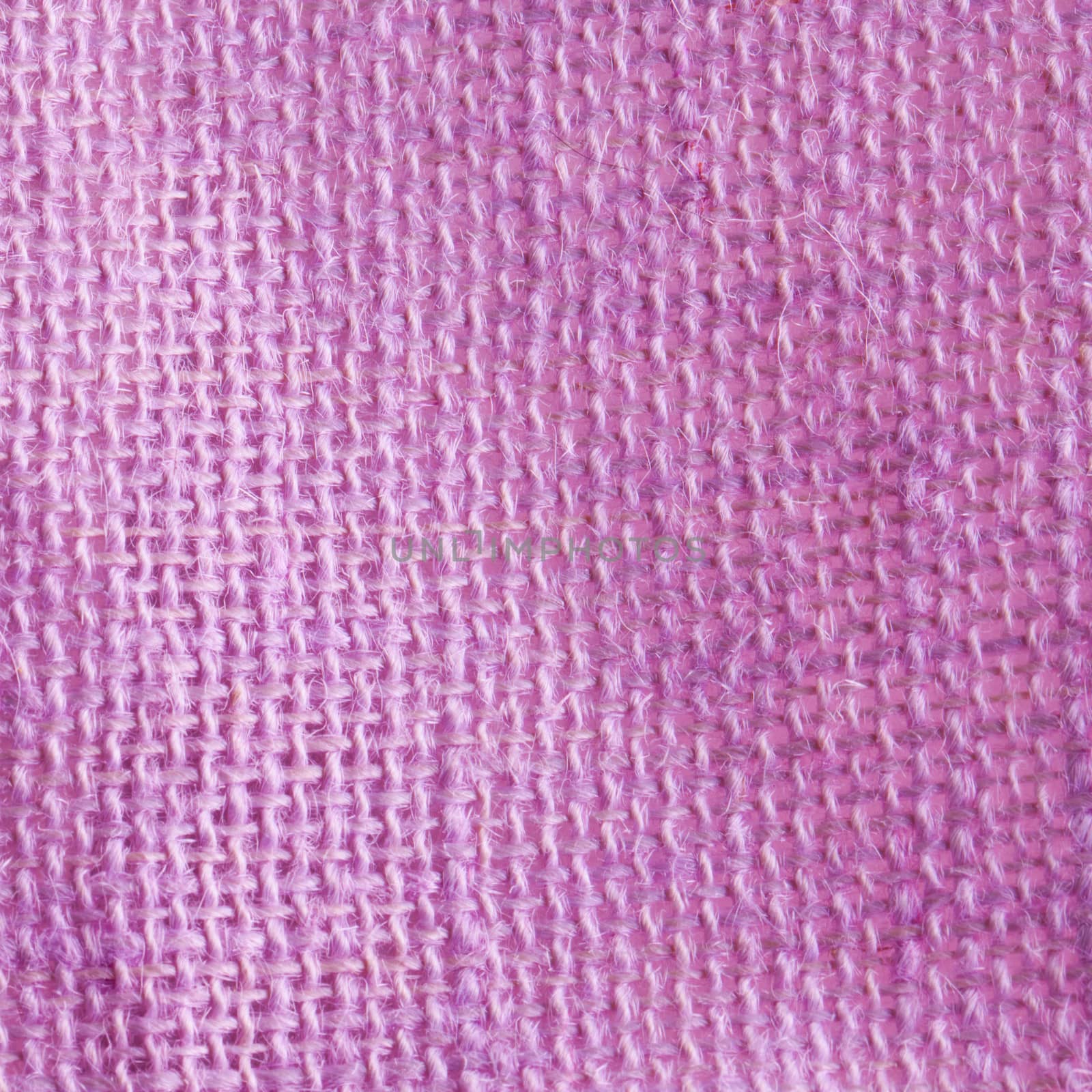 Light purple raffia background in strict close up