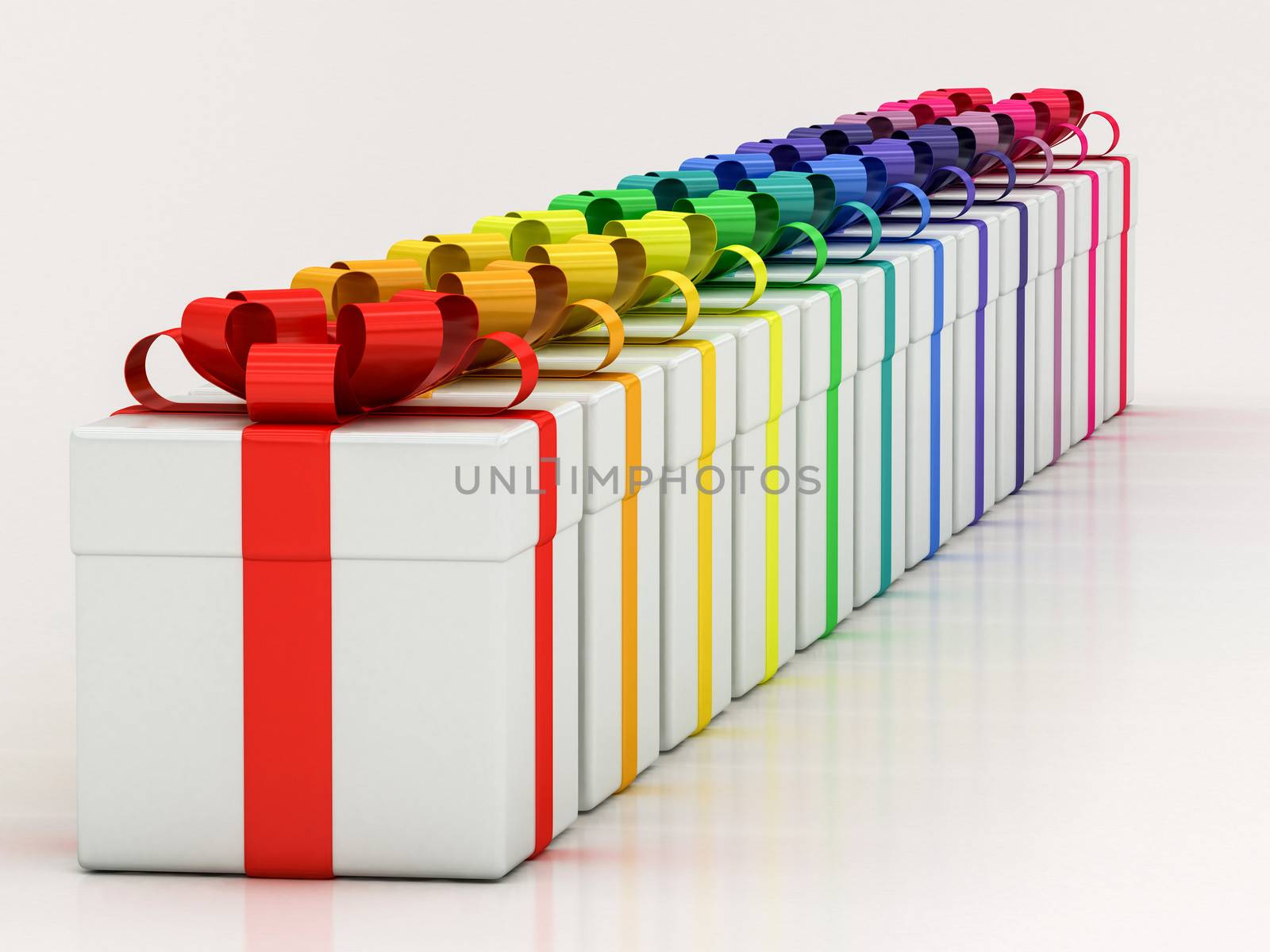 white gift boxes with varicolored ribbon on a white background