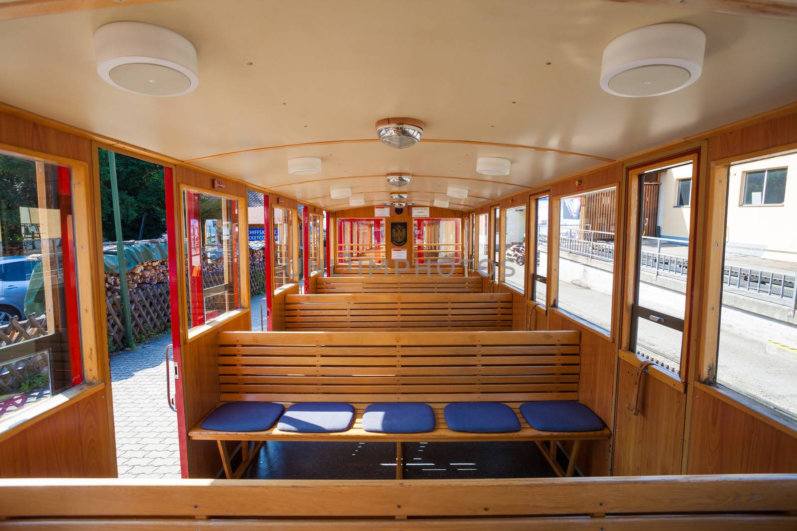 ST. WOLFGANG, AUSTRIA - AUGUST 6: Steam train inside car pasenger benches going to Schafberg Peak (1783m) on August 6, 2013 in St. Wolfgang.