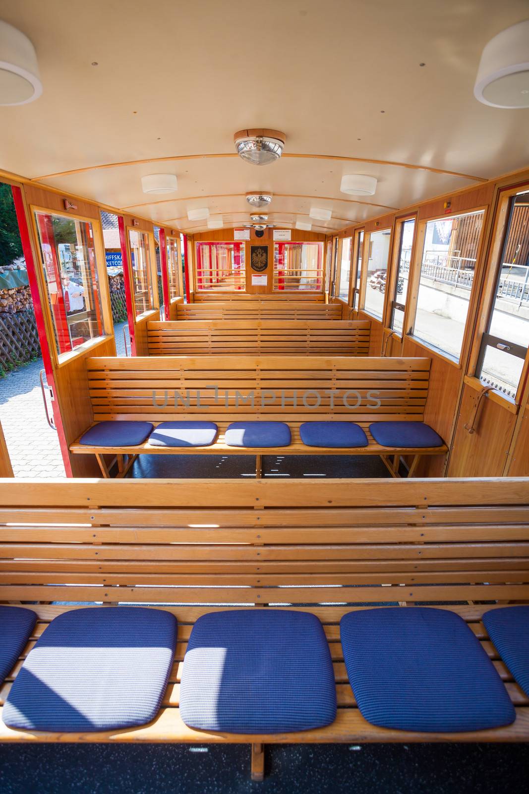 ST. WOLFGANG, AUSTRIA - AUGUST 6: Steam train inside car pasenger benches going to Schafberg Peak (1783m) on August 6, 2013 in St. Wolfgang.