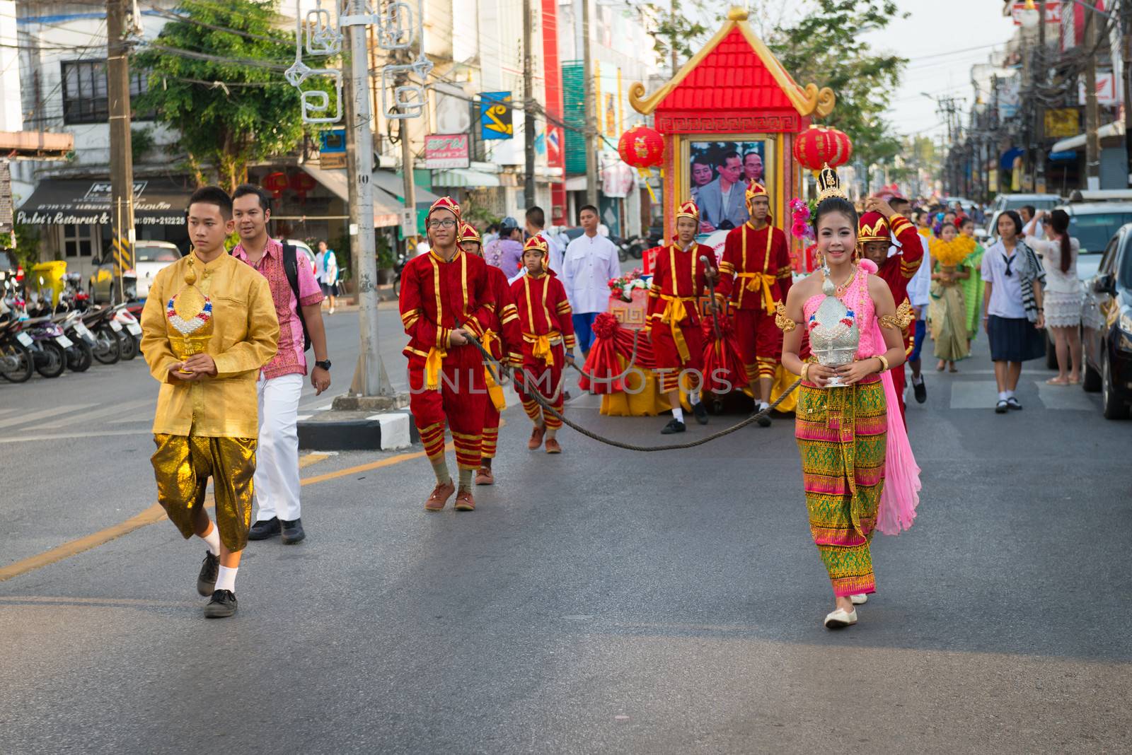 PHUKET, THAILAND - 07 FEB 2014: Phuket town residents take part in procession parade of annual old Phuket town festival. 