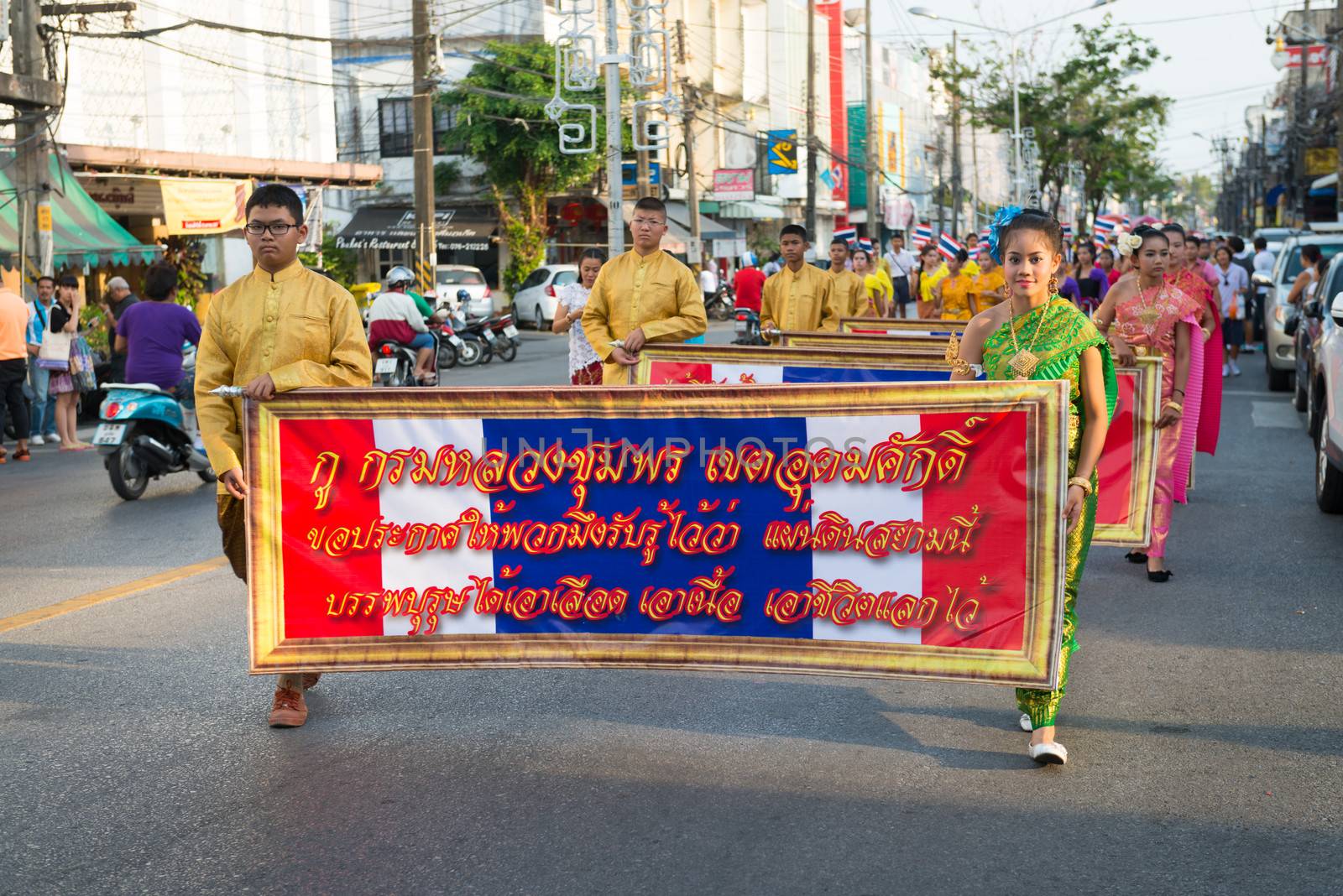 PHUKET, THAILAND - 07 FEB 2014: Phuket town residents take part in procession parade of annual old Phuket town festival. 