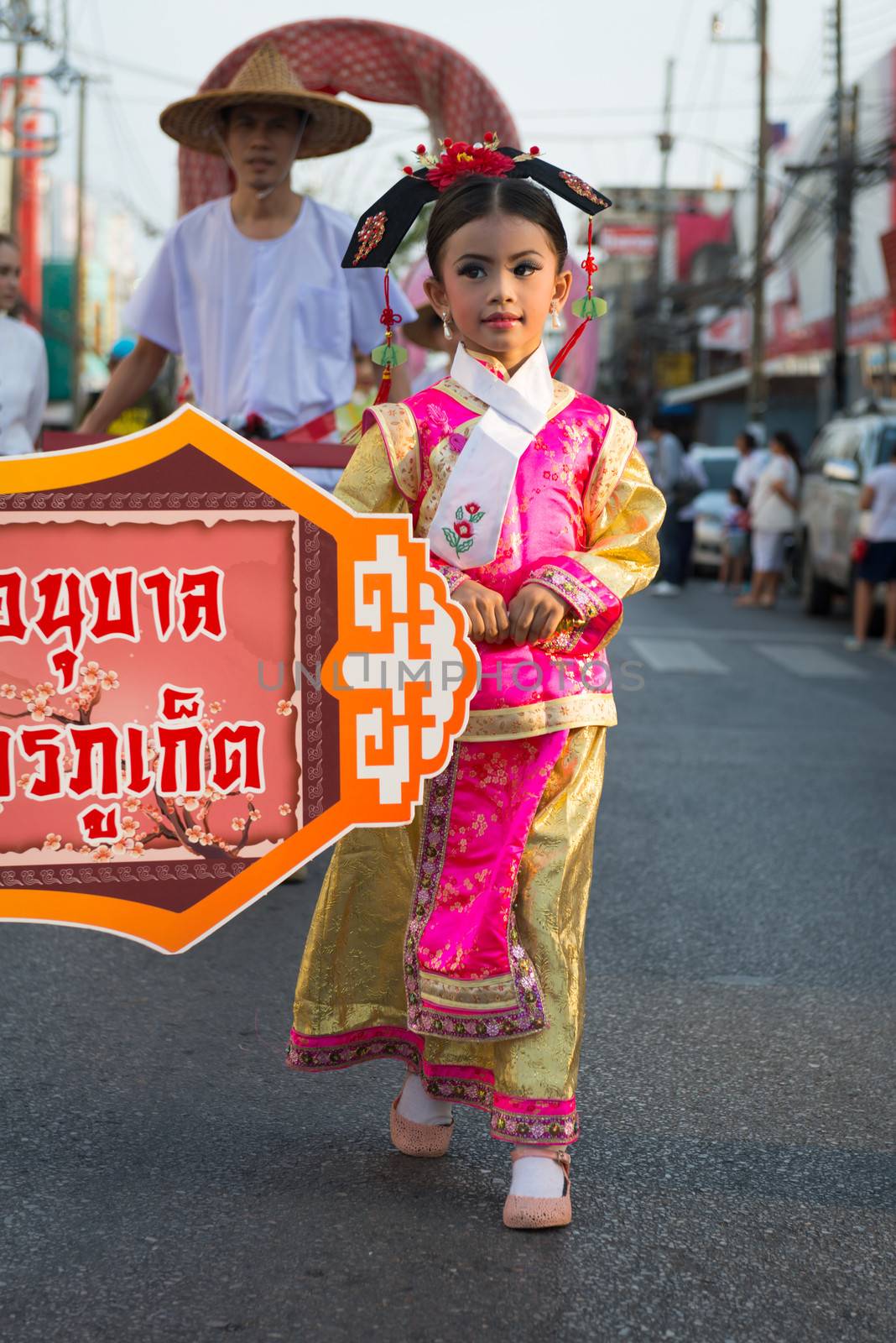 PHUKET, THAILAND - 07 FEB 2014: Rickshas with passenger  take part in procession parade of annual old Phuket town festival. 